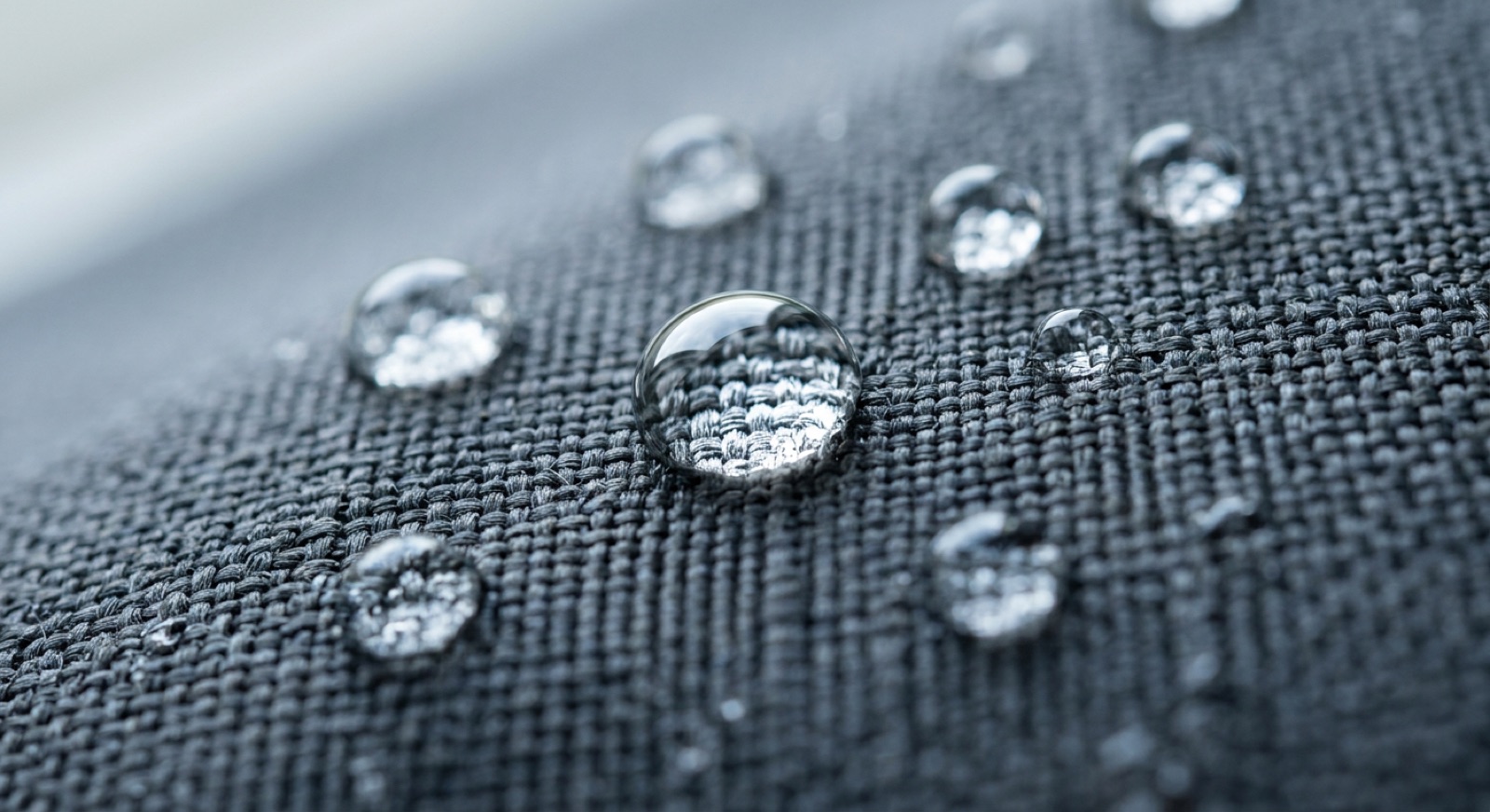 Water beading on a treated performance fabric.